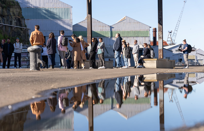 Visitors exploring Cockatoo Island's Docks Precinct while on our Island Highlights Tour.